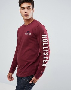 Бордовый лонгслив с принтом на рукаве Hollister - Красный