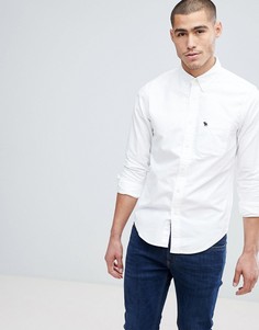 Белая облегающая оксфордская рубашка с воротником на пуговицах Abercrombie &amp; Fitch - Белый