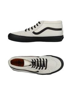 Высокие кеды и кроссовки Vans