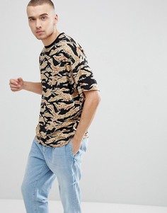 Камуфляжная oversize-футболка ASOS - Зеленый