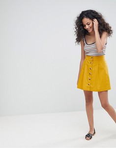 Хлопковая короткая расклешенная юбка с пуговицами спереди ASOS - Желтый