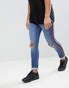 Выбеленные обтягивающие джинсы с потертостями и полосками Jaded London - Синий