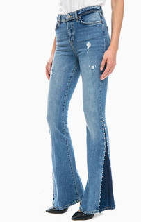 Расклешенные джинсы с металлическим декором Guess