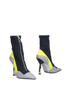 Полусапоги и высокие ботинки Versace