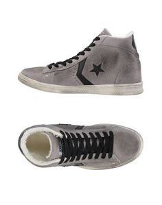 Высокие кеды и кроссовки Converse Cons