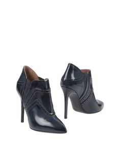 Полусапоги и высокие ботинки Pollini