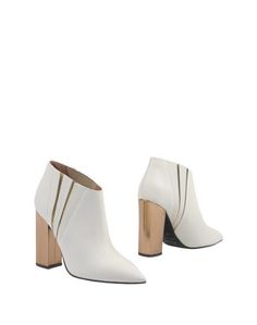 Полусапоги и высокие ботинки Pollini