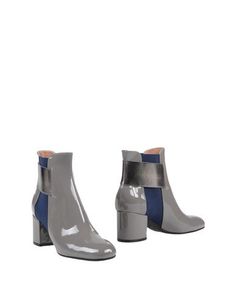 Полусапоги и высокие ботинки Pollini