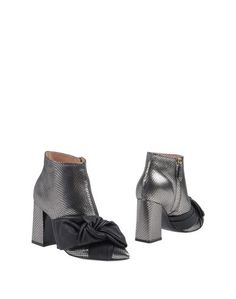 Полусапоги и высокие ботинки Pollini
