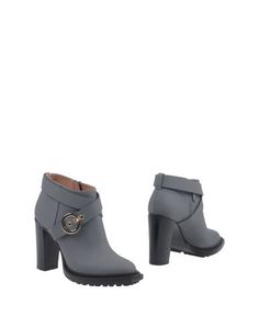 Полусапоги и высокие ботинки Pollini