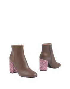 Полусапоги и высокие ботинки Pollini