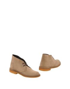 Полусапоги и высокие ботинки Clarks