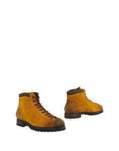 Полусапоги и высокие ботинки Santoni