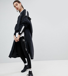 Черные леггинсы с фирменной полосой по бокам Puma эксклюзивно для ASOS - Черный