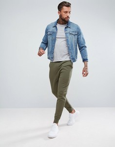 Суперзауженные джоггеры цвета хаки ASOS - Зеленый