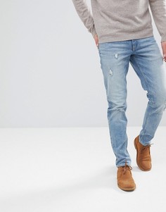 Выбеленные узкие эластичные джинсы с потертостями ASOS - Синий