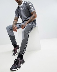 Черные джоггеры скинни adidas Originals PLGN CW5112 - Черный