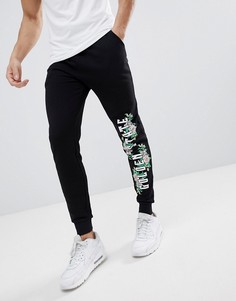 Джоггеры скинни с цветочным принтом ASOS DESIGN - Черный