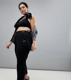 Черные суженые книзу спортивные брюки Nike Plus - Черный
