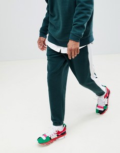 Джоггеры слим с полосками по бокам ASOS x Unknown London - Зеленый
