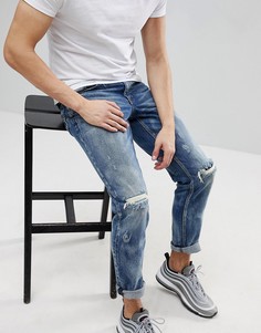 Темные стретчевые джинсы слим с выбеленным эффектом и рваной отделкой ASOS - Синий