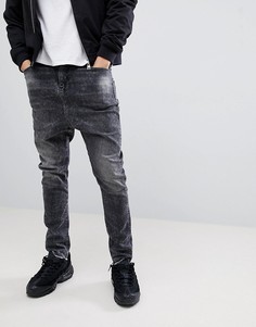 Черные джинсы заниженного кроя с необработанными краями ASOS DESIGN - Черный