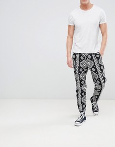 Суженные книзу брюки с ацтекским узором ASOS DESIGN - Серый
