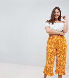 Брюки в горошек с расклешенными манжетами ASOS DESIGN Curve - Оранжевый