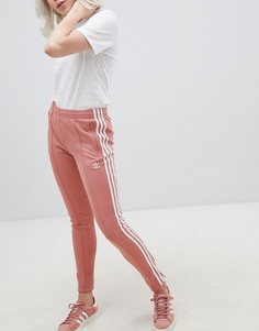 Розовые брюки-сигареты adidas Originals - Розовый