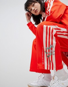 Красно-розовые спортивные брюки adidas Originals - Красный