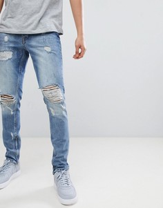 Синие джинсы с рваной отделкой Criminal Damage - Синий