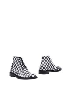 Полусапоги и высокие ботинки Saint Laurent