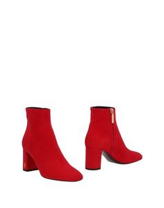 Полусапоги и высокие ботинки Saint Laurent