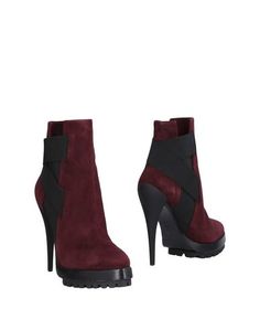 Полусапоги и высокие ботинки Casadei