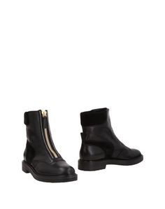 Полусапоги и высокие ботинки Casadei