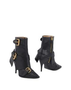 Полусапоги и высокие ботинки Moschino