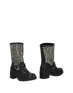Полусапоги и высокие ботинки Guess