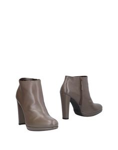 Полусапоги и высокие ботинки Stuart Weitzman