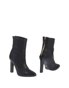 Полусапоги и высокие ботинки Versace