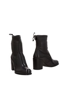 Полусапоги и высокие ботинки Stuart Weitzman