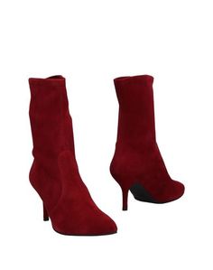 Полусапоги и высокие ботинки Stuart Weitzman