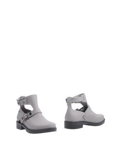 Полусапоги и высокие ботинки Melissa