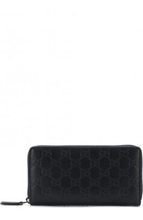 Кожаное портмоне на молнии с тиснением Signature Gucci