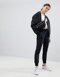 Джоггеры с фирменным поясом Tommy Jeans - Черный