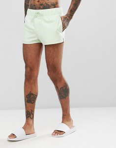 Светло-зеленые короткие шорты для плавания ASOS DESIGN - Зеленый