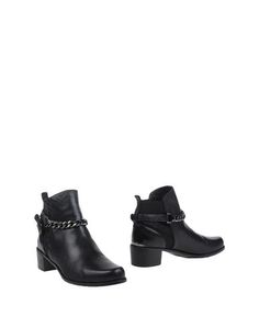 Полусапоги и высокие ботинки Stuart Weitzman