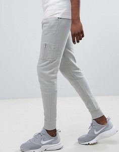 Светло-серые джоггеры скинни с карманом ASOS DESIGN - Бежевый