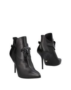 Полусапоги и высокие ботинки Versace
