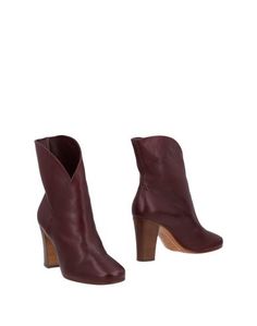 Полусапоги и высокие ботинки CÉline
