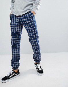 Темно-синие узкие джоггеры в клетку ASOS DESIGN - Темно-синий